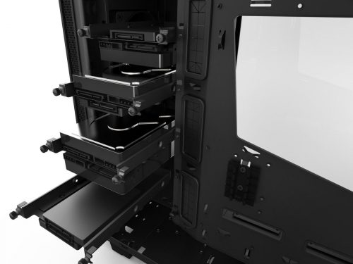 The NZXT H440 has room for 11 drives "sideways" in the front, right behind three large fans!
